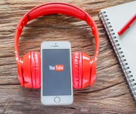 iPhone with red headphones Stock Photo