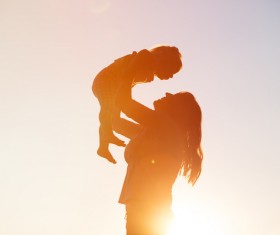 lift the mother of the child Stock Photo