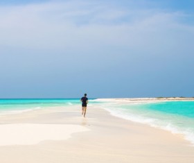 man running on the beach Stock Photo 01