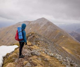 man standing on ridge Stock Photo