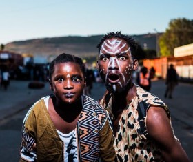 man with a totem on his face Stock Photo