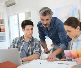teacher who instructs students to analyze the dat Stock Photo