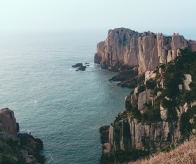 tranquil rocky beach landscape Stock Photo