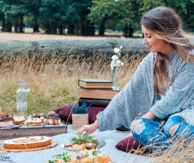 young girl preparing camping food Stock Photo