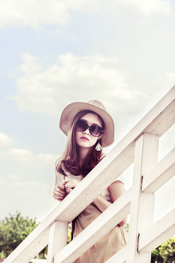 Asian girl wearing sunglasses Stock Photo