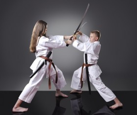 Athlete with Japanese knife in hand Stock Photo