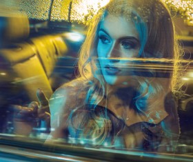Beautiful blonde sitting in limousine Stock Photo