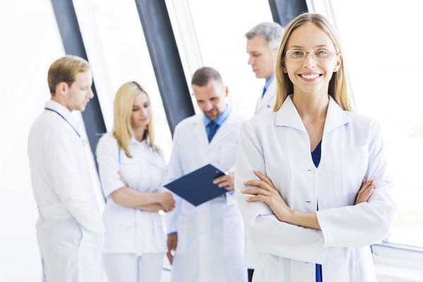 Beautiful comely female doctor Stock Photo