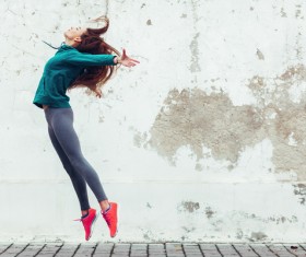 Beautiful jumping girl Stock Photo