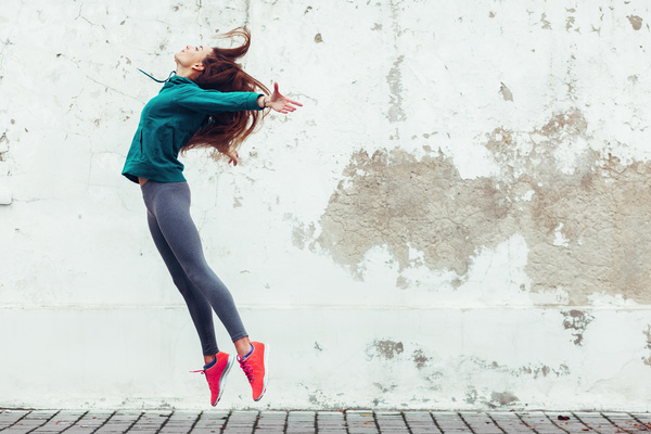 Beautiful jumping girl Stock Photo