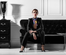 Beautiful model wearing black suit Stock Photo