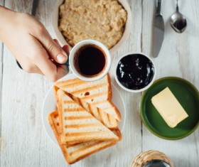 Breakfast coffee bread with butter and jam Stock Photo