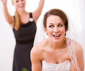 Bride throwing bouquet Stock Photo