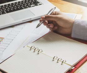 Businessman calculating market data Stock Photo 01