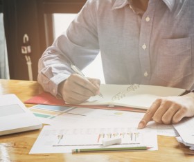 Businessman calculating market data Stock Photo 02