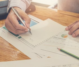 Businessman calculating market data Stock Photo 03