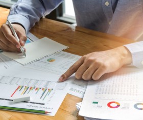 Businessman calculating market data Stock Photo 05