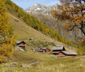 Cabin at the foot of the mountain Stock Photo