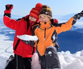 Children having fun outdoors in winter Stock Photo 01