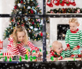 Children playing toy train together Stock Photo 05