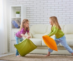 Children playing with pillows Stock Photo 03