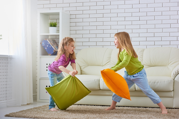 Children playing with pillows Stock Photo 03