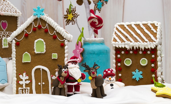 Christmas cookies house and trinkets Stock Photo