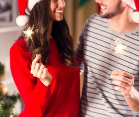 Christmas couple put fireworks Stock Photo 02