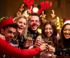 Christmas gathering of friends Stock Photo