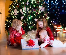 Christmas gift kids watching Stock Photo 02