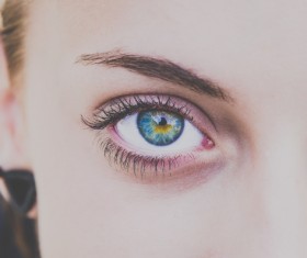 Closeup of woman blue eye Stock Photo