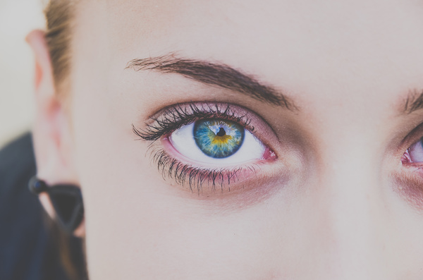Closeup of woman blue eye Stock Photo