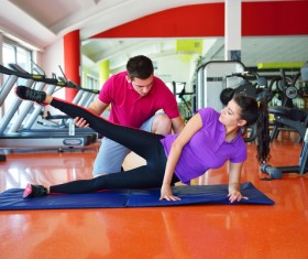 Coach corrects girl sport gesture Stock Photo 01