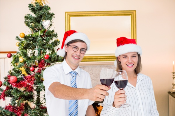 Couples celebrate Christmas Stock Photo