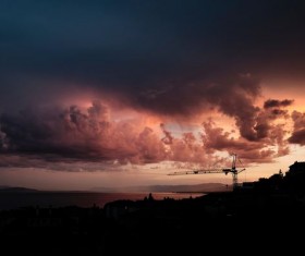 Dark clouds in the sunset sky Stock Photo
