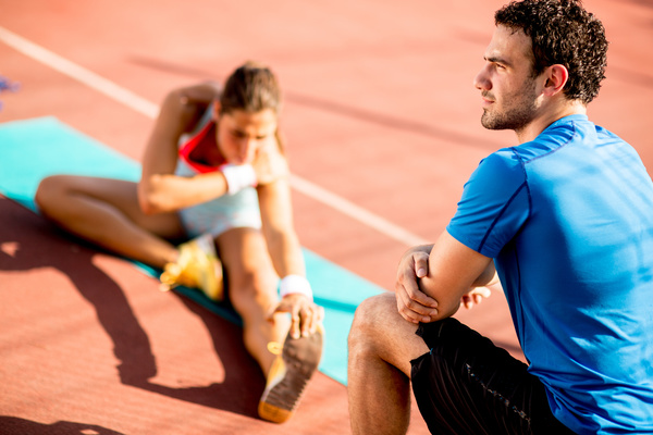 Do stretching exercise girls and male coaches Stock Photo