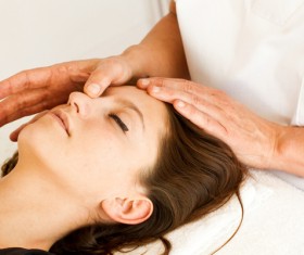 Facial massage and maintenance Stock Photo