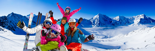 Family enjoying winter skiing fun Stock Photo 02