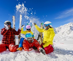 Family enjoying winter skiing fun Stock Photo 03