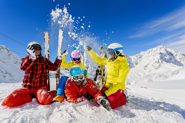 Family enjoying winter skiing fun Stock Photo 03