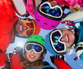 Family enjoying winter skiing fun Stock Photo 04