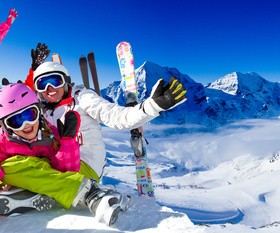 Family enjoying winter skiing fun Stock Photo 06