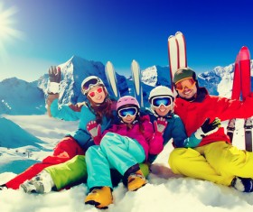 Family enjoying winter skiing fun Stock Photo 07
