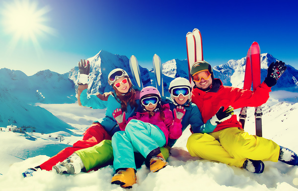 Family enjoying winter skiing fun Stock Photo 07