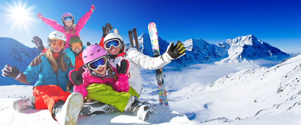 Family enjoying winter skiing fun Stock Photo 09 free download