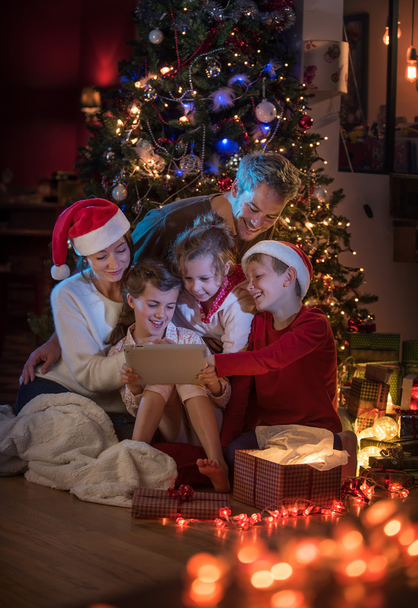 Family sitting together on Christmas Eve Stock Photo 02