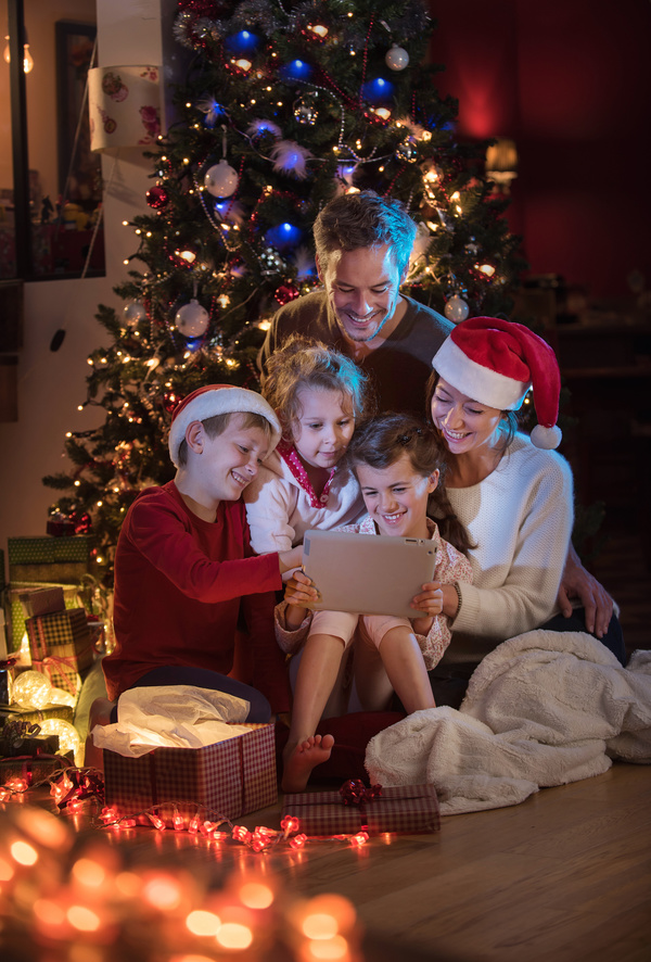 Family sitting together on Christmas Eve Stock Photo 03
