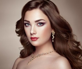 Fashion makeup girl wearing jewelry Stock Photo