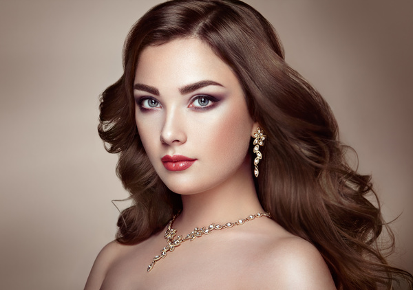 Fashion makeup girl wearing jewelry Stock Photo