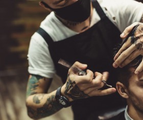 Fashionable male hairdresser Stock Photo